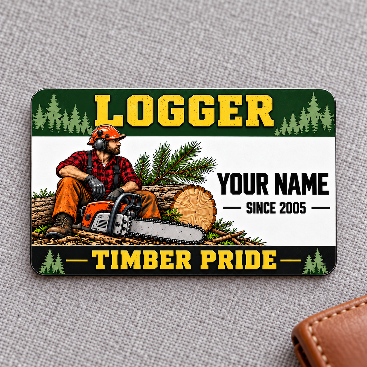 Logger Green Band aluminum wallet card on cool gray woven fabric.