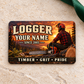Logger Sunset Workday aluminum wallet card on pale beige stone.