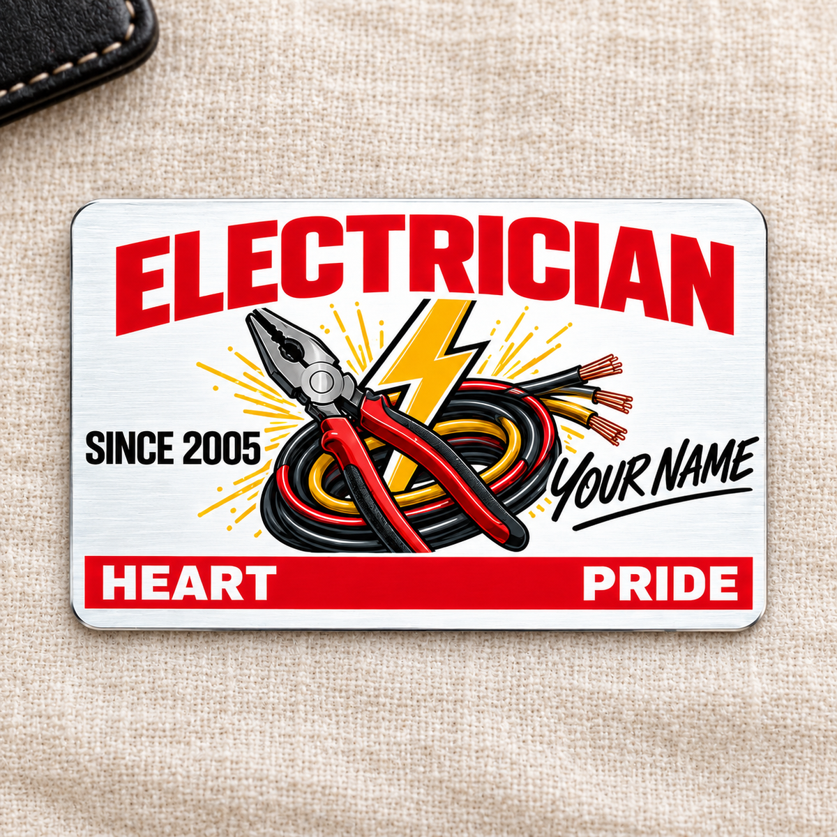 Electrician Signature Classic aluminum wallet card on cream linen