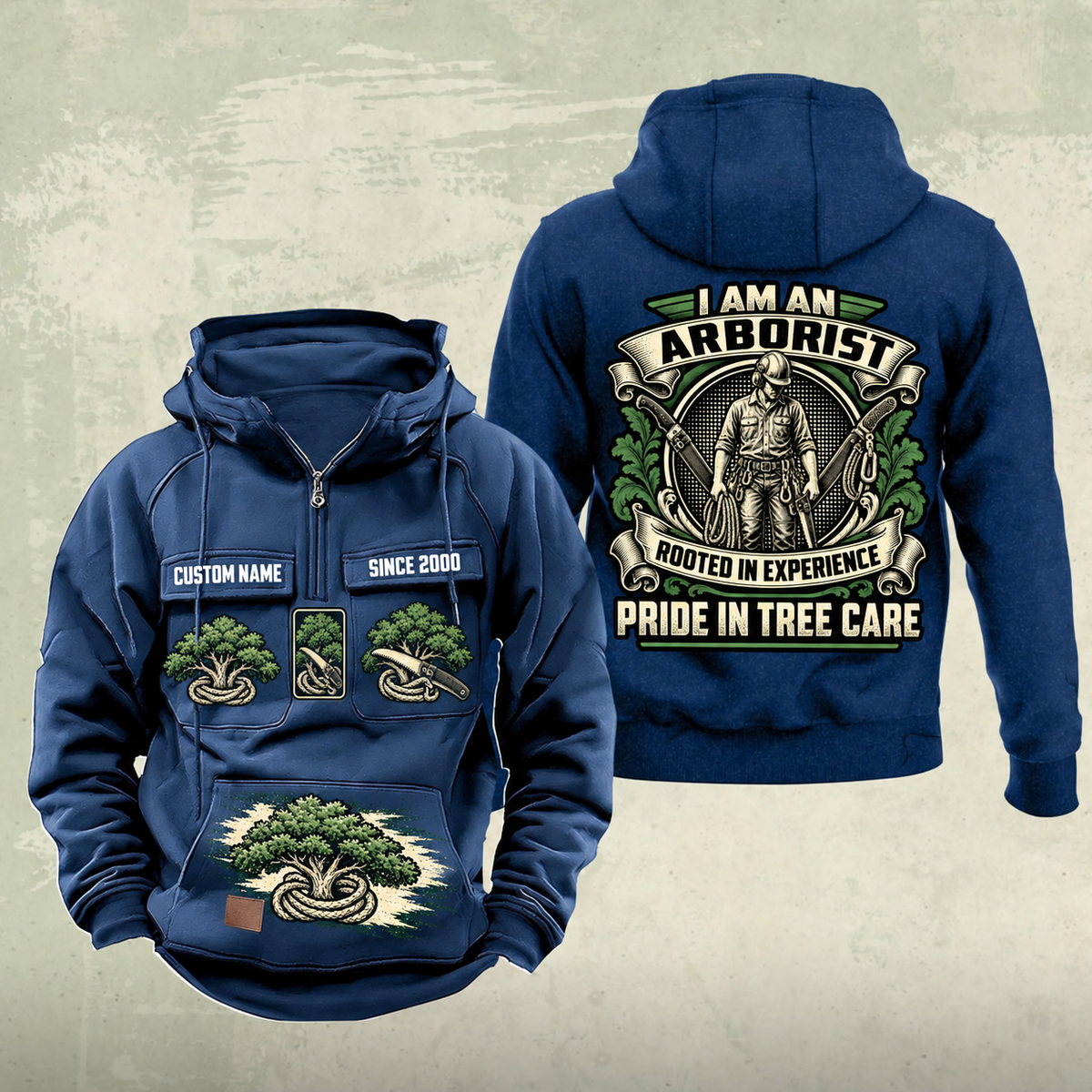 Arborist Heritage Crest Vintage Hoodie in Dark Blue, front and back views with sample chest text CUSTOM NAME and SINCE 2000, ornate arborist back crest, tree-and-rope chest graphics and lower brush-stroke motif.