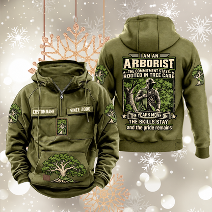 Arborist Skills and Pride Vintage Hoodie in Military Green, front and back views with sample text CUSTOM NAME and SINCE 2000, living-tree artwork and sleeve symbols.