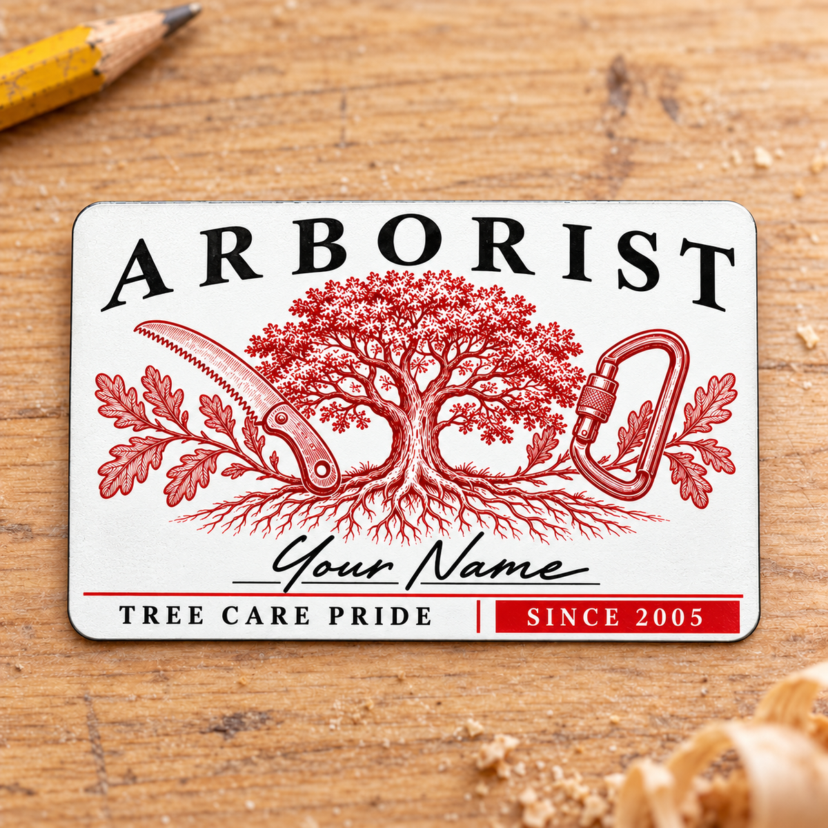 Front of the Arborist Signature Classic aluminum wallet card on pale wood.