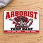Arborist Signature Modern aluminum wallet card, front view on pale oak.