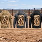 Five complete back views of the Bull Rider Daily Commitment Portrait Vintage Hoodie in Military Green, Kaki, Dark Gray, Black and Dark Blue, with matching tall kneeling rider prints and paired upper-sleeve motifs in an empty rodeo arena.