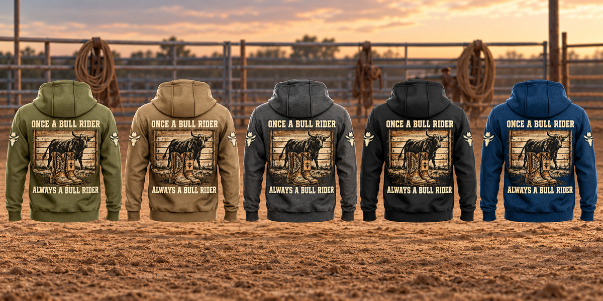 Bull Rider Once and Always Vintage Hoodie in Military Green, Kaki, Dark Gray, Black and Dark Blue, five complete back views arranged in a rodeo arena with fence and leather equipment at rest.
