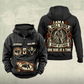 Bull Rider Heritage Crest Vintage Hoodie in Black, front and back views with ornate cowboy-and-rope crest, chest and lower-panel bull motifs, plain sleeves, and sample text CUSTOM NAME and SINCE 2000.