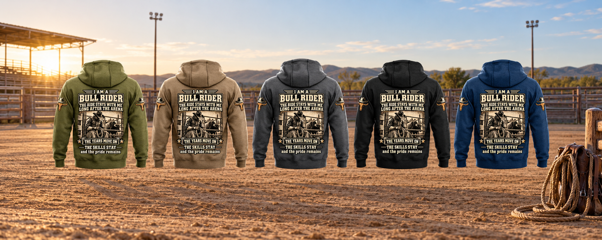Five complete back views of the Bull Rider Skills and Pride Vintage Hoodie in Military Green, Kaki, Dark Gray, Black and Dark Blue, arranged separately in an empty rodeo arena with coiled equipment at rest.