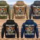 Five complete separated back views of the Bull Rider By Choice Vintage Hoodie in Military Green, Kaki, Dark Gray, Black and Dark Blue, against an empty rodeo arena fence with coiled rope and riding gloves.