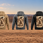 Five Bull Rider Workday Portrait Vintage Hoodie back views in Military Green, Kaki, Dark Gray, Black and Dark Blue, with kneeling rider artwork in an empty rodeo arena setting.