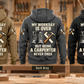 Carpenter Never Ends Vintage Hoodie in Military Green, Kaki, Dark Gray, Black and Dark Blue, five fully separated back views above a woodworking bench with timber offcuts and hand tools.