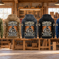 Five complete back views of the Carpenter Skills and Pride Vintage Hoodie in Military Green, Kaki, Dark Gray, Black and Dark Blue, arranged separately in a quiet woodworking workshop.