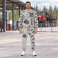Personalized Komatsu 875 8WD Forwarder Operator Combo Sweater + Jogger in Light Gray, sweater and jogger artwork with YOUR NAME and SINCE 2000 sample text.