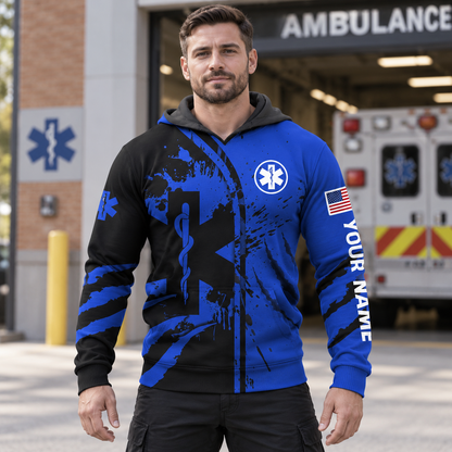 Personalized EMS paramedic hoodie featuring blue star of life splatter print all-over print, worn by a model