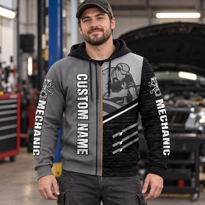 Personalized mechanic hoodie featuring grey black mechanic at work all-over print, worn by a model