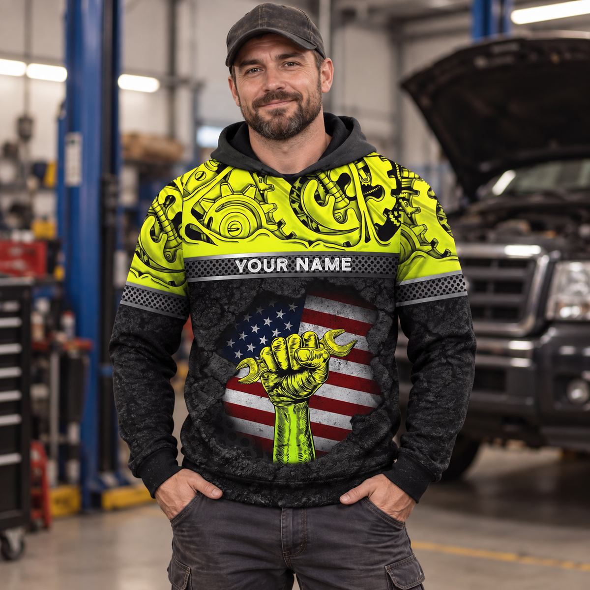 Personalized mechanic hoodie featuring yellow gears wrench fist american flag all-over print, worn by a model