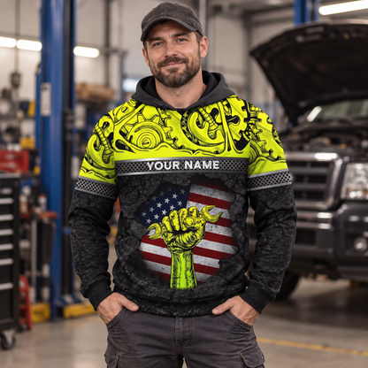 Personalized mechanic hoodie featuring yellow gears wrench fist american flag all-over print, worn by a model