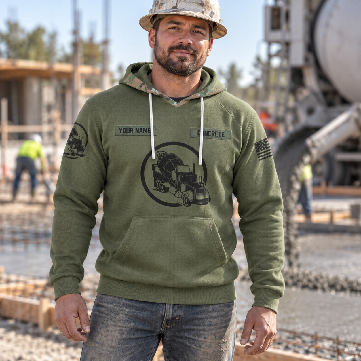 Concrete finisher hoodie featuring olive green concrete mixer badge all-over print, worn by a model