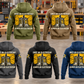 Five complete back views of the Electrician Once and Always Vintage Hoodie in Military Green, Kaki, Dark Gray, Black and Dark Blue, with matching boots and circuit-panel artwork in an organized electrical workshop.