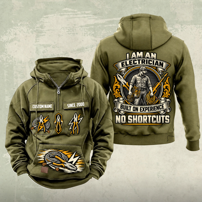 Electrician Heritage Crest Vintage Hoodie in Military Green, front and back views with sample text CUSTOM NAME and SINCE 2000, electrical tool graphics and an ornate electrician portrait crest.
