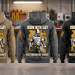 Five complete back views of the Electrician By Choice Vintage Hoodie in Military Green, Kaki, Dark Gray, Black and Dark Blue, arranged separately in an organized electrical workshop.