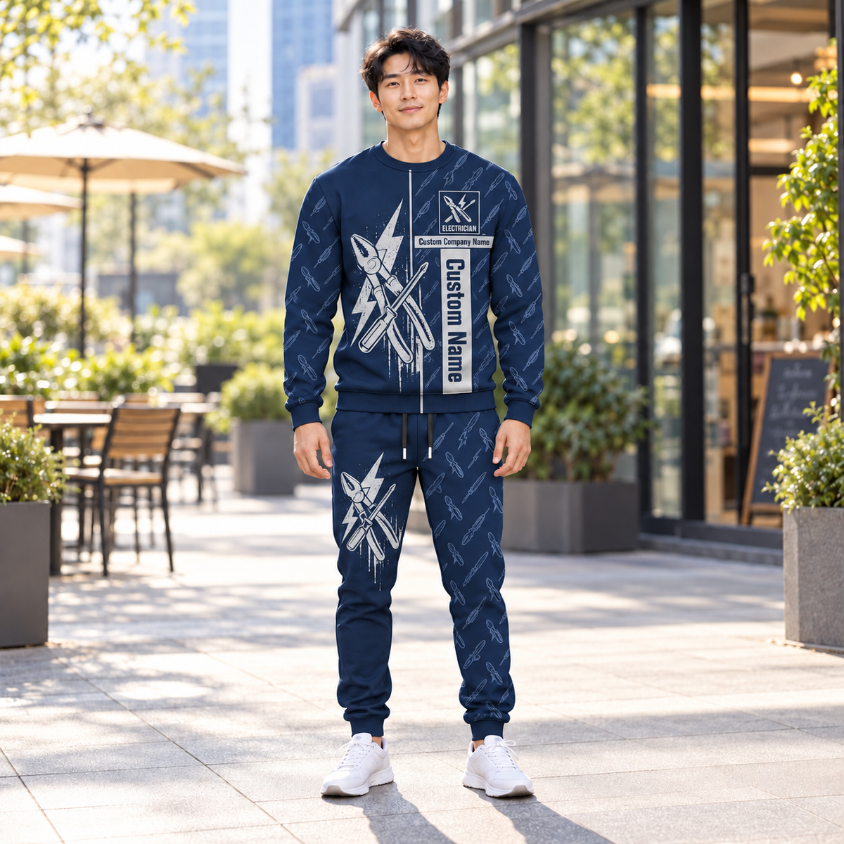 electrician occupation-themed sweater and jogger combo on a model with name and company artwork