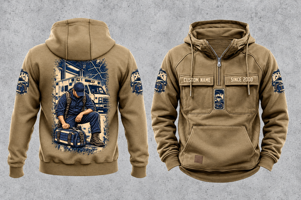 EMS Daily Commitment Portrait Vintage Hoodie in Kaki, separated front and back views with sample text CUSTOM NAME and SINCE 2000, generic ambulance-and-response-bag sleeve motifs, and a kneeling worker back illustration.
