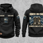 EMS Once and Always Vintage Hoodie in Black, separate front and back views with CUSTOM NAME and SINCE 2000 chest text, generic ambulance and response-bag motifs, and framed duty-boots artwork.