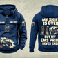 EMS Never Ends Vintage Hoodie in Dark Blue, complete separated front and back views with sample chest text CUSTOM NAME and SINCE 2000, boots, ambulance and closed response bag artwork.