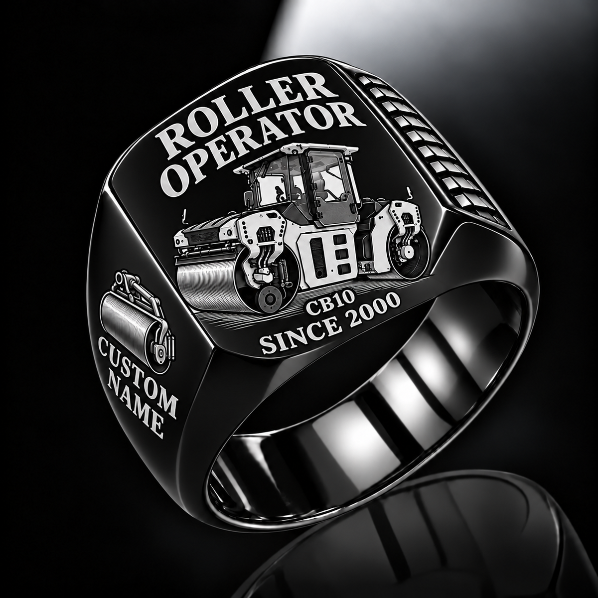Personalized CB10 Roller Operator Ring in black finish, with flat tandem smooth-drum engraving, CUSTOM NAME and SINCE 2000.