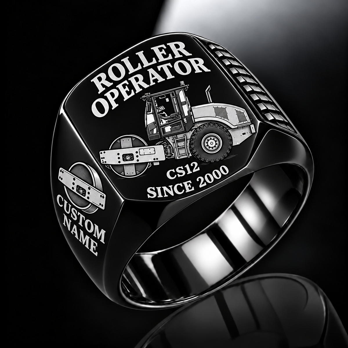 Personalized CS12 Roller Operator Ring in black finish, with flat single-drum soil compactor engraving, CUSTOM NAME and SINCE 2000.