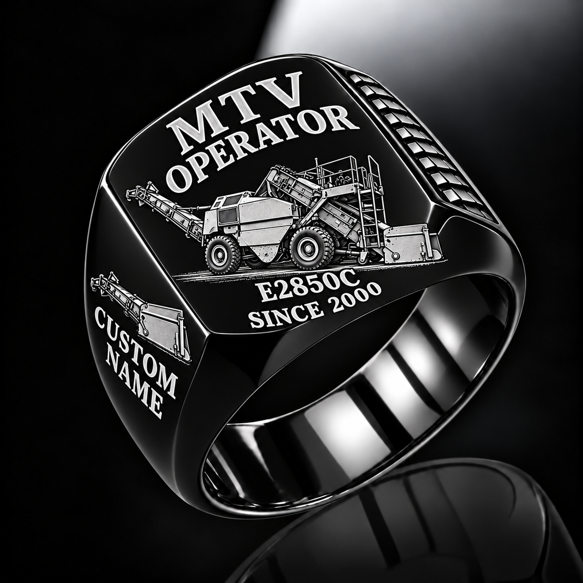 Black personalized E2850C material transfer vehicle operator signet ring with flat machine artwork and MTV OPERATOR, E2850C, CUSTOM NAME and SINCE 2000 engraving.