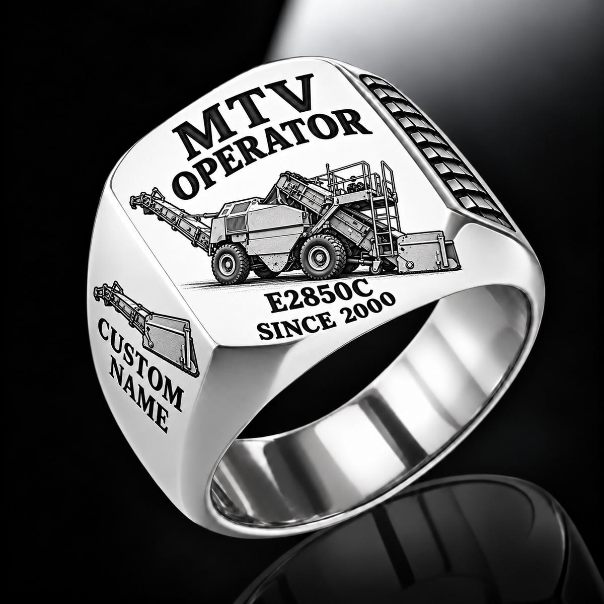 Silver personalized E2850C material transfer vehicle operator signet ring with flat machine artwork and MTV OPERATOR, E2850C, CUSTOM NAME and SINCE 2000 engraving.