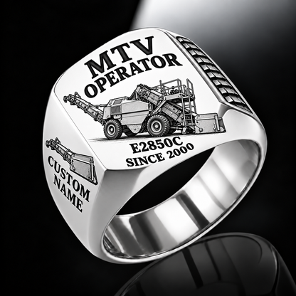 Silver personalized E2850C material transfer vehicle operator signet ring with flat machine artwork and MTV OPERATOR, E2850C, CUSTOM NAME and SINCE 2000 engraving.
