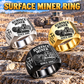 T1655III Terrain Leveler Surface Miner Ring in Silver, Gold and Black finishes, flat machine engraving, CUSTOM NAME and SINCE 2000 sample text.