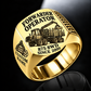 Komatsu 875 8WD Forwarder Operator Ring in Gold finish, flat engraving showing plain log grapple and loaded stake-sided timber bunk, CUSTOM NAME and SINCE 2000.