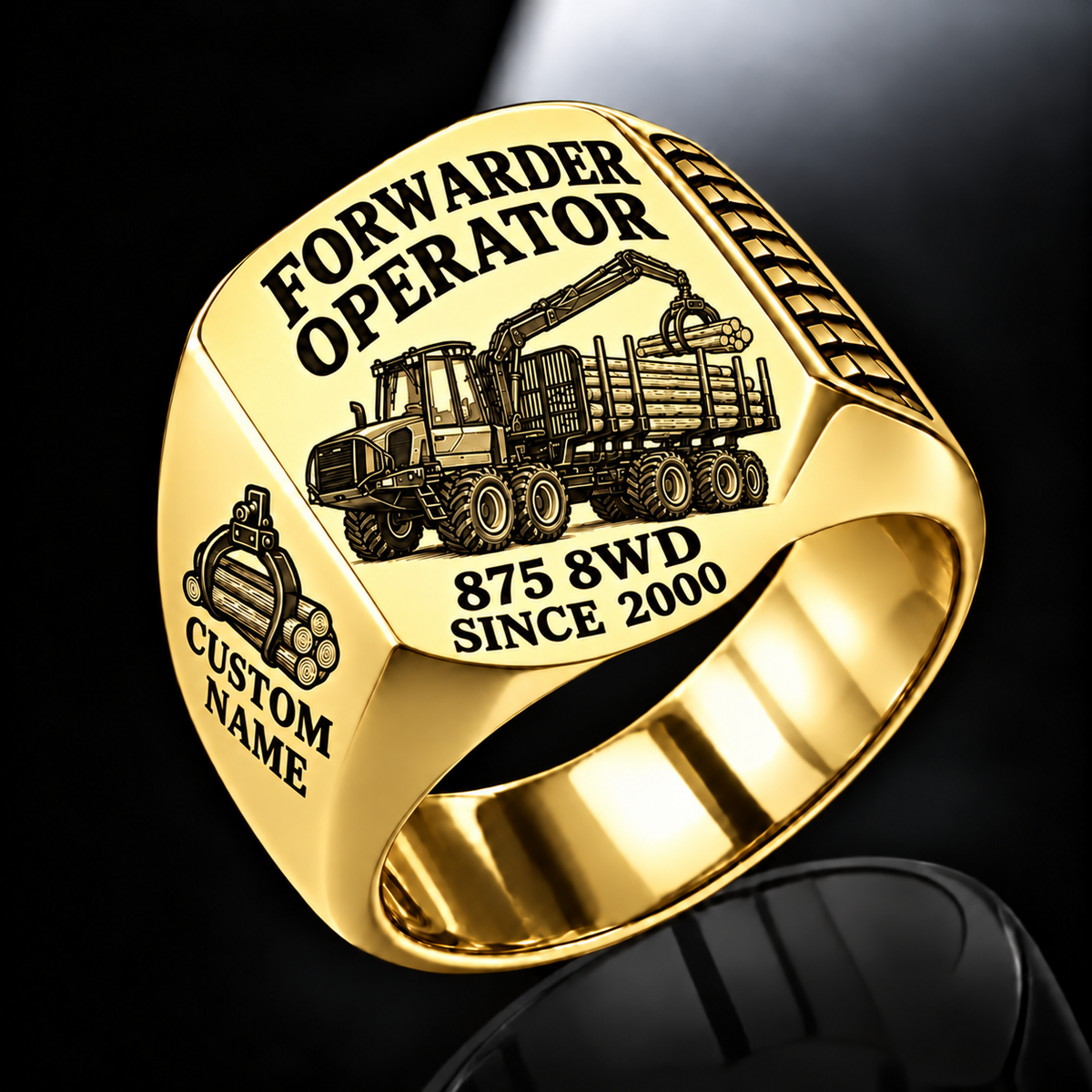 Komatsu 875 8WD Forwarder Operator Ring in Gold finish, flat engraving showing plain log grapple and loaded stake-sided timber bunk, CUSTOM NAME and SINCE 2000.