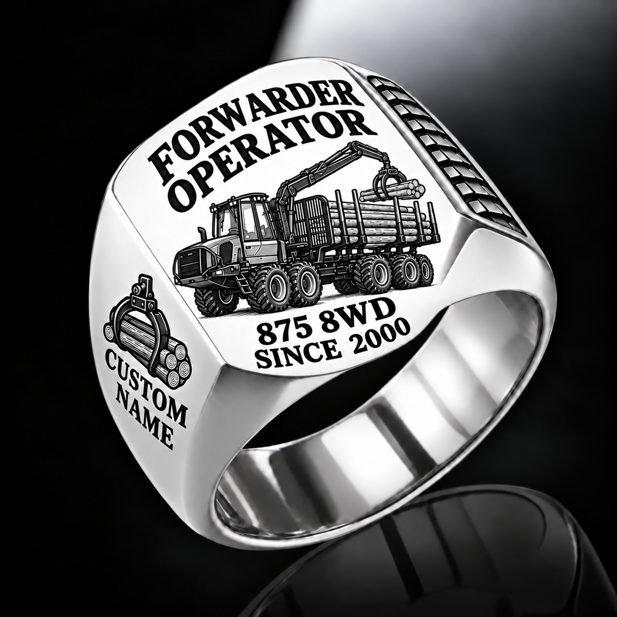 Komatsu 875 8WD Forwarder Operator Ring in Silver finish, flat engraving showing plain log grapple and loaded stake-sided timber bunk, CUSTOM NAME and SINCE 2000.