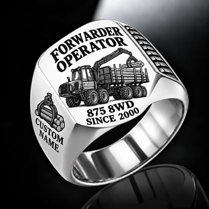 Komatsu 875 8WD Forwarder Operator Ring in Silver finish, flat engraving showing plain log grapple and loaded stake-sided timber bunk, CUSTOM NAME and SINCE 2000.