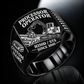 Tigercat H250D with 575 Processor Operator Ring in Black finish, flat engraving showing roller-and-knife head feeding a horizontal felled log, CUSTOM NAME and SINCE 2000.
