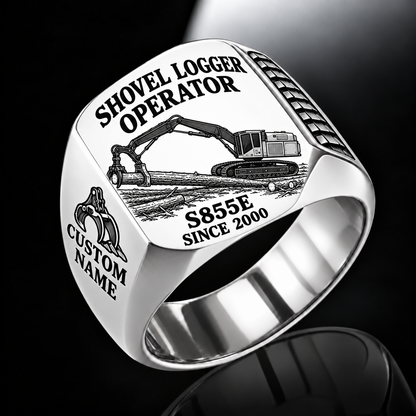 Tigercat S855E Shovel Logger Operator Ring in Silver finish, flat engraving showing connected live-heel frame and timber grapple supporting a whole stem, CUSTOM NAME and SINCE 2000.