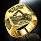 Tigercat LS855E Shovel Logger Operator Ring in Gold finish, flat engraving showing connected live-heel frame and timber grapple supporting a whole stem, CUSTOM NAME and SINCE 2000.