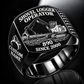 Tigercat 890 Shovel Logger Operator Ring in Black finish, flat engraving showing connected live-heel frame and timber grapple supporting a whole stem, CUSTOM NAME and SINCE 2000.