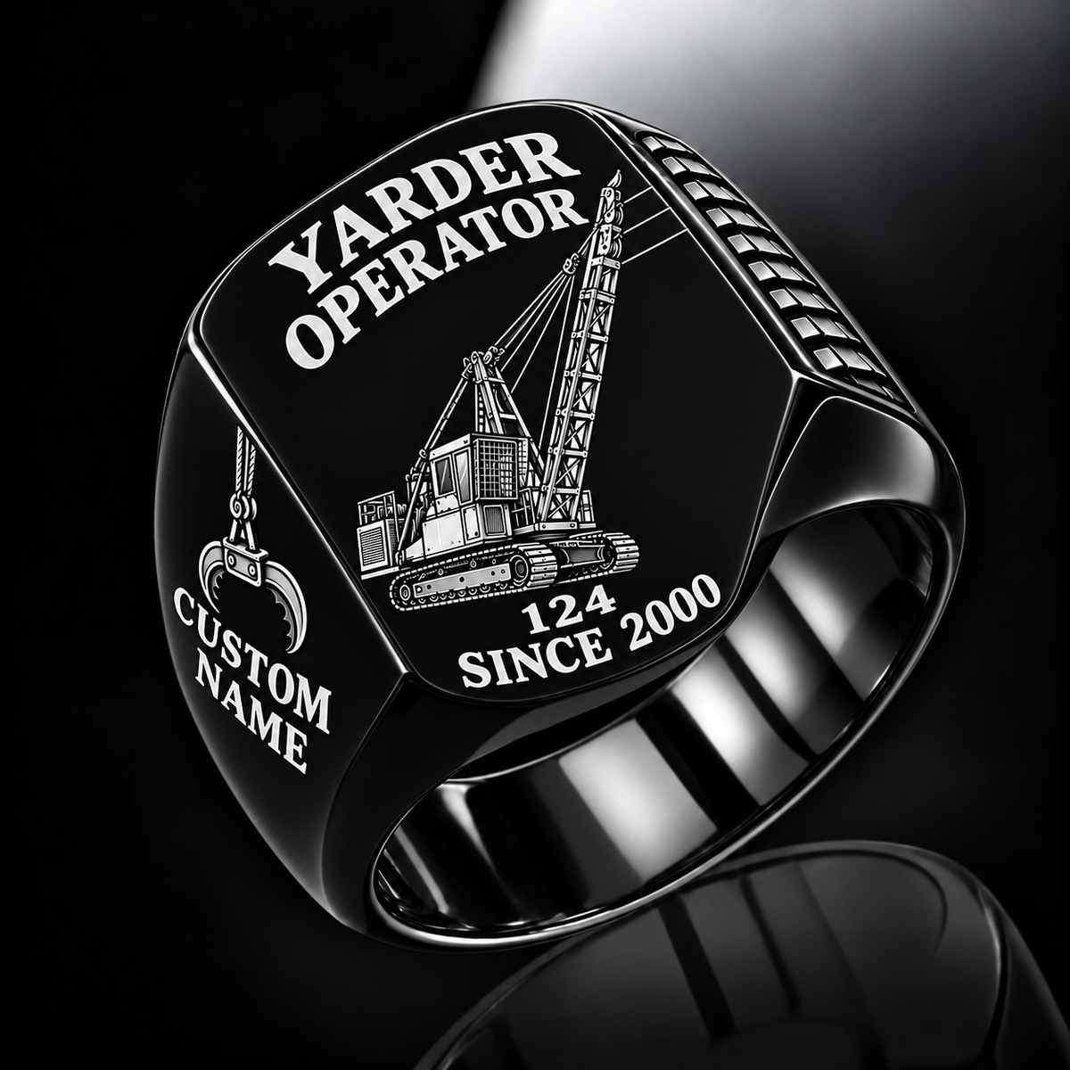 Madill 124 Yarder Operator Ring in Black finish, flat engraving showing lattice boom, sheaves and cable rigging, CUSTOM NAME and SINCE 2000.
