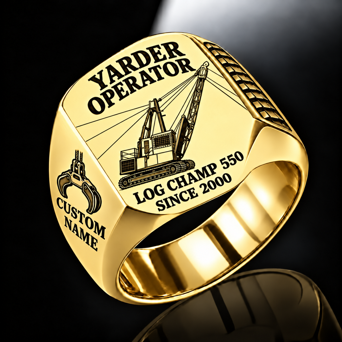 T-MAR Log Champ 550 Yarder Operator Ring in Gold finish, flat engraving showing lattice boom, sheaves and cable rigging, CUSTOM NAME and SINCE 2000.