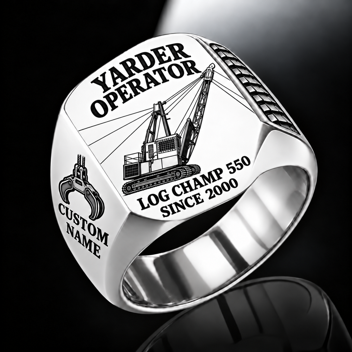 T-MAR Log Champ 550 Yarder Operator Ring in Silver finish, flat engraving showing lattice boom, sheaves and cable rigging, CUSTOM NAME and SINCE 2000.