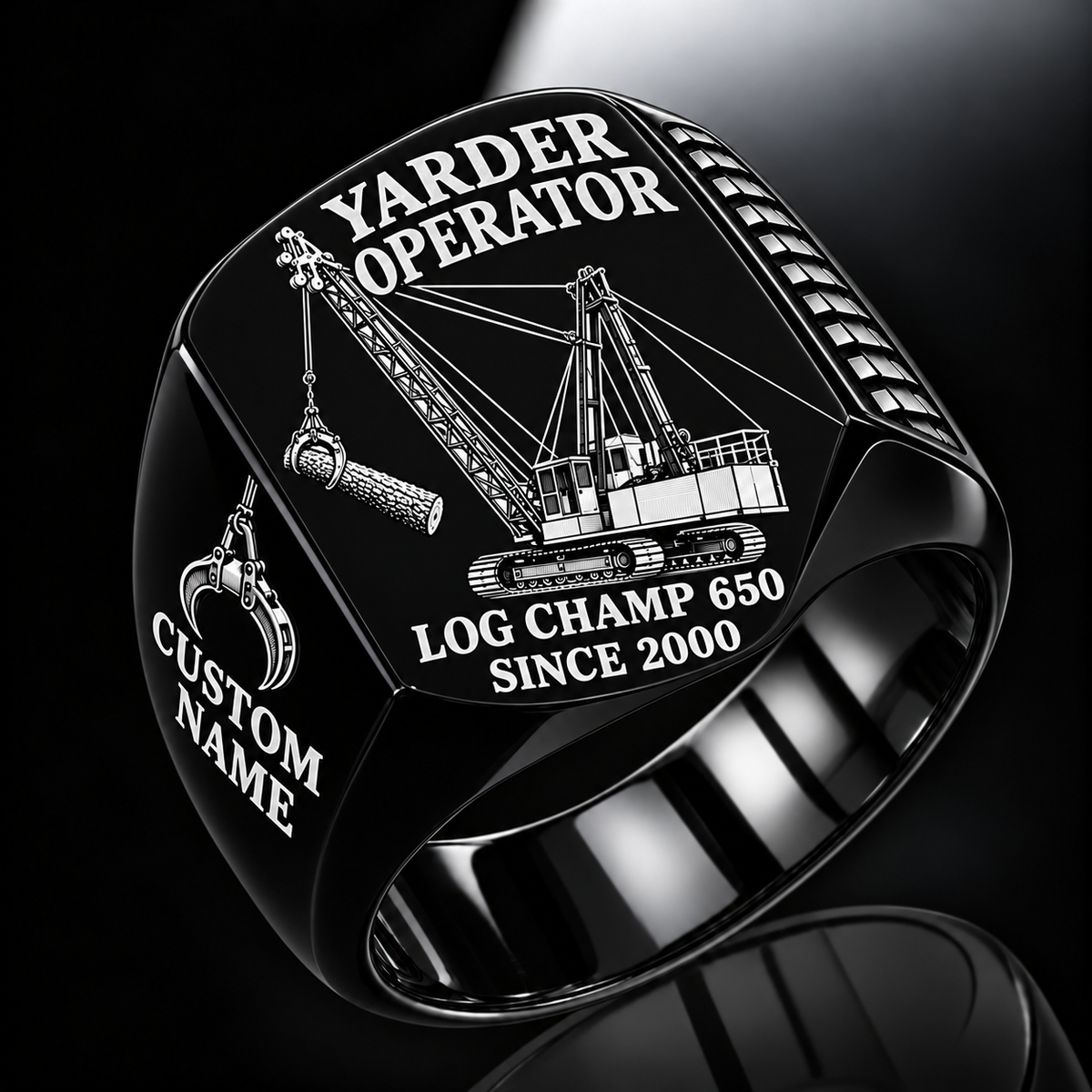 T-MAR Log Champ 650 Yarder Operator Ring in Black finish, flat engraving showing lattice boom, sheaves and cable rigging, CUSTOM NAME and SINCE 2000.