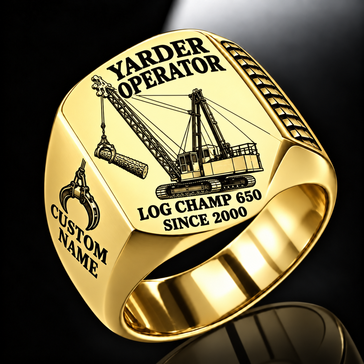 T-MAR Log Champ 650 Yarder Operator Ring in Gold finish, flat engraving showing lattice boom, sheaves and cable rigging, CUSTOM NAME and SINCE 2000.