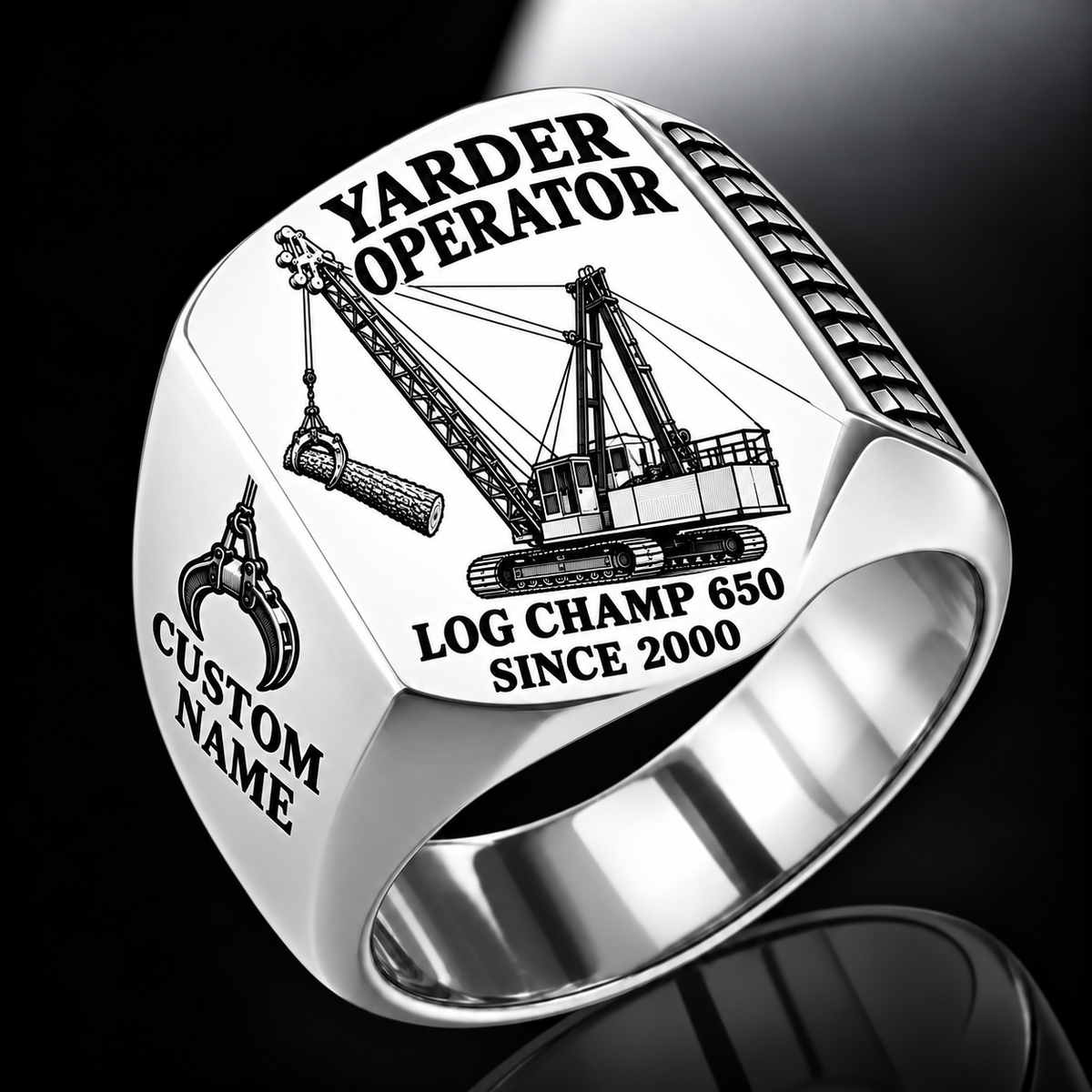T-MAR Log Champ 650 Yarder Operator Ring in Silver finish, flat engraving showing lattice boom, sheaves and cable rigging, CUSTOM NAME and SINCE 2000.