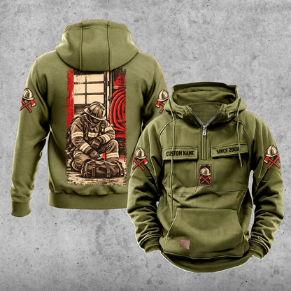 Firefighter Daily Commitment Portrait Vintage Hoodie in Military Green, back and front views with tall kneeling-firefighter panel, helmet-and-crossed-axes sleeve motifs, and sample chest text CUSTOM NAME and SINCE 2000.