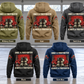Five separate complete back views of the Firefighter Once and Always Vintage Hoodie in Military Green, Kaki, Dark Gray, Black and Dark Blue, each labelled beneath, with matching boots-and-hose artwork in a quiet firehouse bay with equipment at rest.